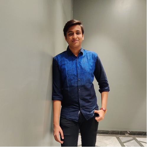 A person in a blue shirt

Description automatically generated with medium confidence